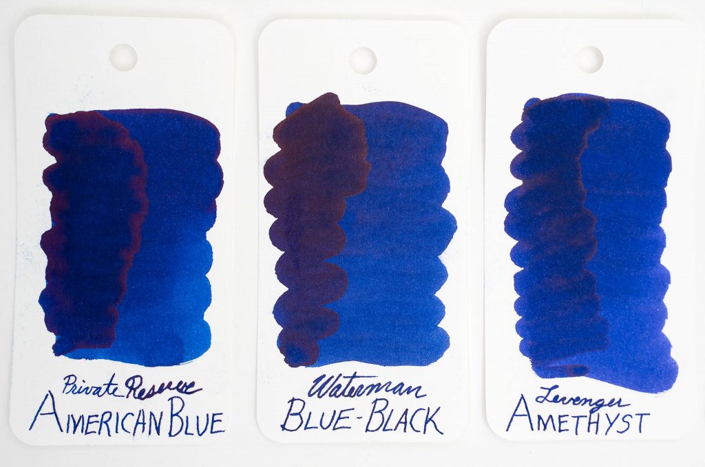 Color comparison swatches of Private Reserve American Blue ink, Waterman Blue-Black ink, and Levenger Amethyst ink.